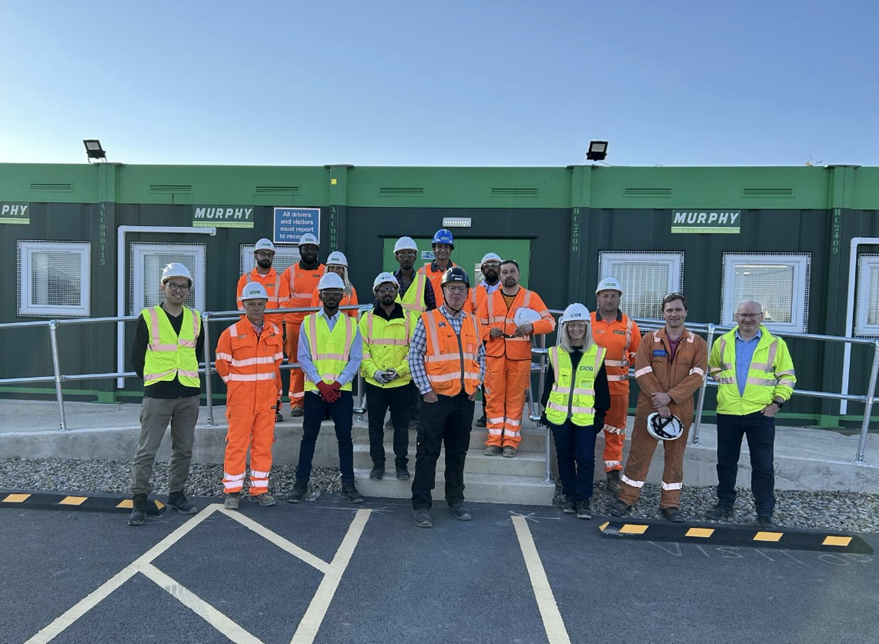 CIOB site-visit participants and project professionals assembled in full site PPE