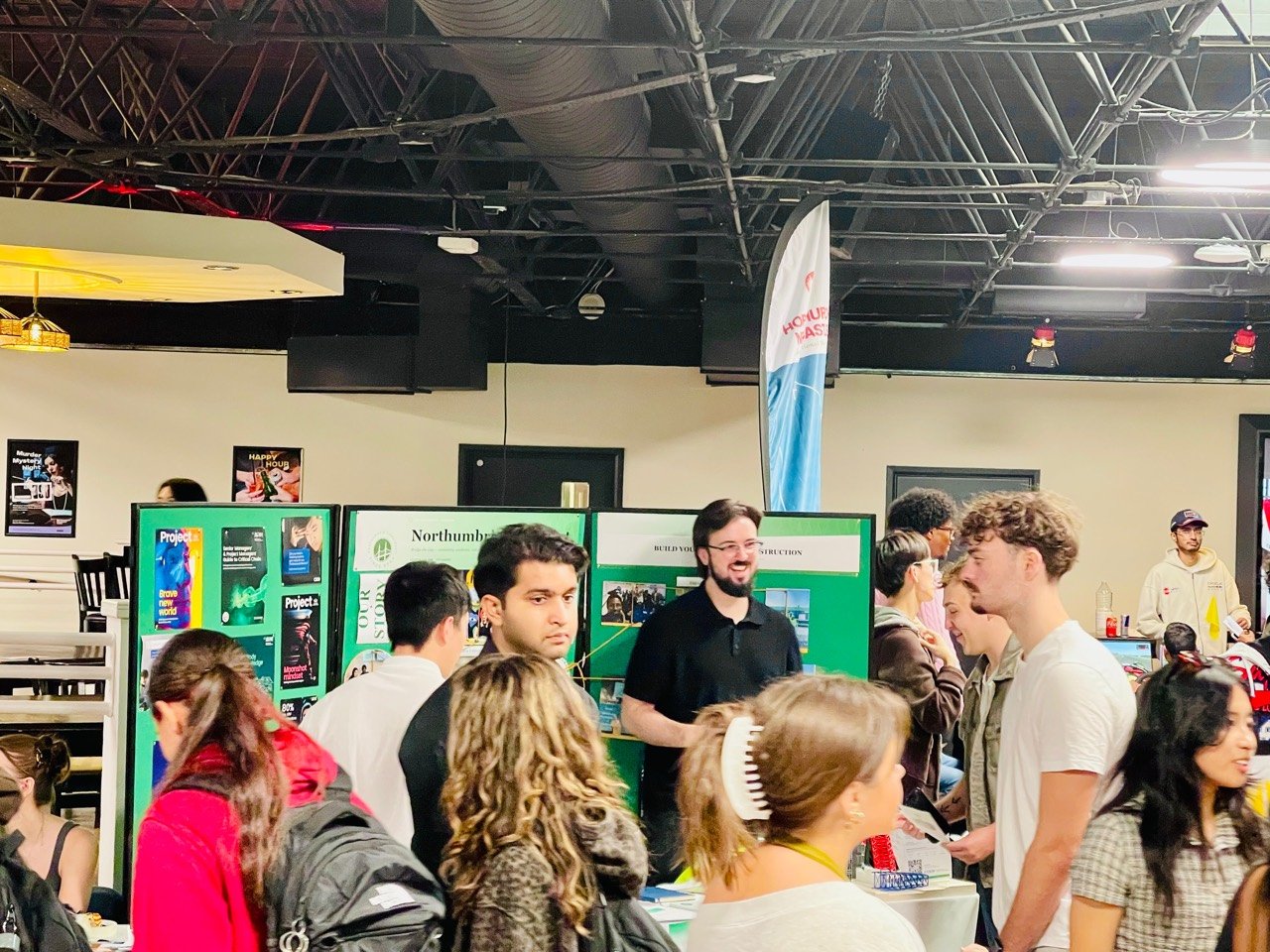 Students gathering at the Northumbria Construct stand during the Societies Fair